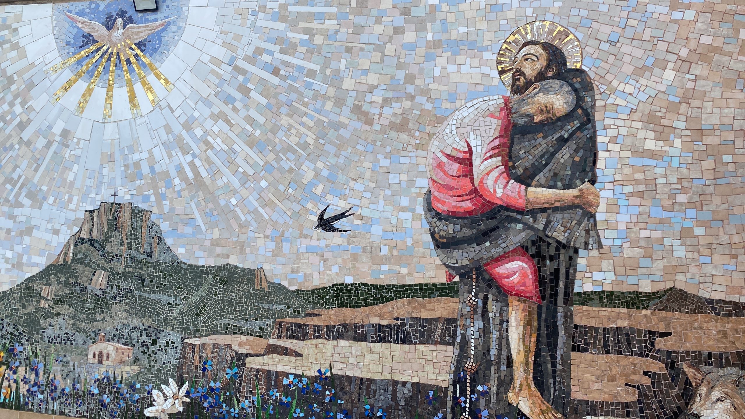 Mosaico de San Francisco cuidando del leproso, ejemplo del Carisma Franciscano TOR